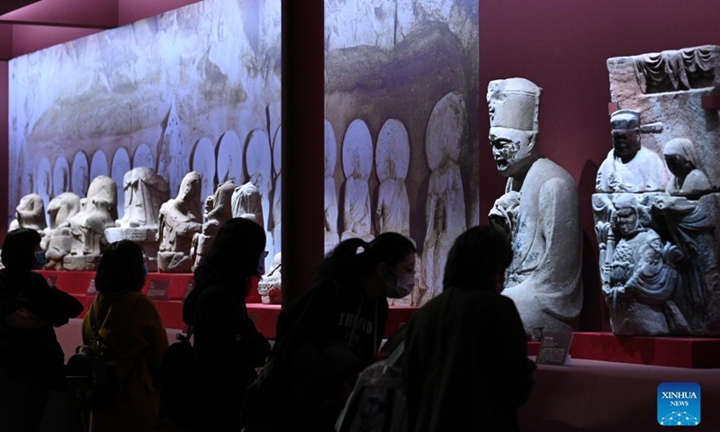 Visitors look at exhibits at the National Museum of China in Beijing, capital of China, Nov. 13, 2021.Photo:Xinhua