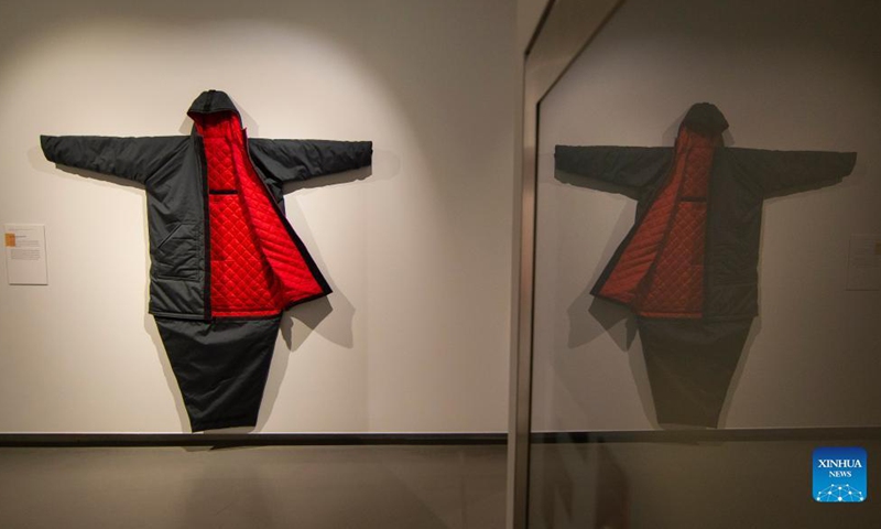 Photo taken on Nov. 13, 2021 shows a coat that can be transformed into a sleeping bag at the exhibition Survival Architecture and the Art of Resilience in Toronto, Canada.Photo:Xinhua