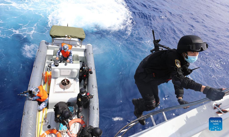 Members of the 38th escort fleet of the Chinese People's Liberation Army (PLA) Navy conduct a drill on May 20, 2021. A Chinese naval fleet Monday returned to a military port in Zhoushan, east China's Zhejiang Province, after concluding escort missions in the Gulf of Aden and the waters off Somalia.(Photo: Xinhua)