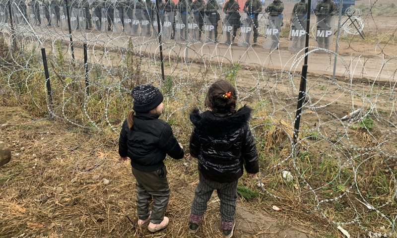 Children are seen at a refugee camp near the Belarusian-Polish border in Belarus, Nov. 14, 2021. (Photo: Xinhua)