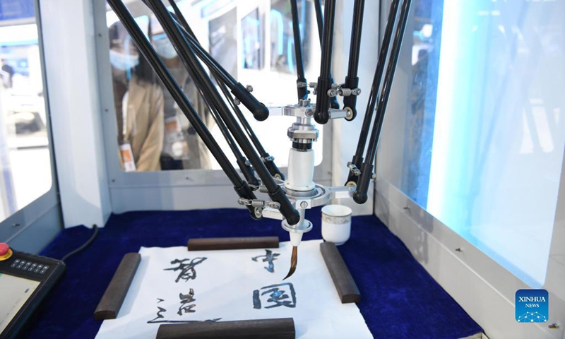 Photo taken on Nov. 19, 2021 shows a robot at the fourth World Manufacturing Convention in Hefei, east China's Anhui Province. The fourth World Manufacturing Convention kicked off Friday in Hefei, capital of east China's Anhui Province. The four-day event, themed innovation-driven, digitally empowered: global manufacturing industry aligned for high-quality growth, aims to promote high-quality manufacturing and deepen exchanges between China and the rest of the world. (Xinhua/Zhang Duan)