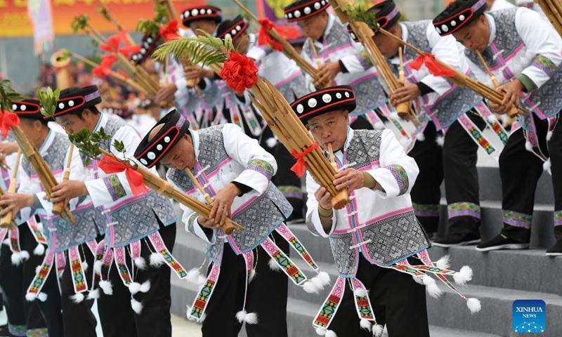 People perform to celebrate the 70th anniversary of the founding of Longsheng County in Longsheng County, south China's Guangxi Zhuang Autonomous Region, Nov. 19, 2021. A celebration event was held in Longsheng on Friday, marking the 70th anniversary of the founding of the autonomous county resided by people of various ethnic groups. (Xinhua/Lu Boan)