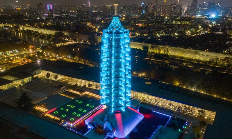 Aerial photo taken on Nov. 20, 2021 shows the Grand Baoen Temple Heritage and Scenic Area lit up blue to celebrate World Children's Day in Nanjing, east China's Jiangsu Province.Photo:Xinhua