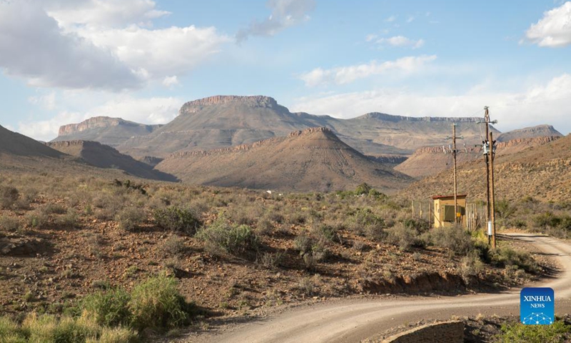 Photo taken on Nov. 21, 2021 shows a view of Karoo National Park, Western Cape Province, South Africa. Karoo National Park is a small portion of the Great Karoo, a vast and unforgiving landscape. Being the largest ecosystem in South Africa, the Karoo is home to a fascinating diversity of life, all having adapted to survive in these harsh conditions. (Xinhua/Lyu Tianran) 