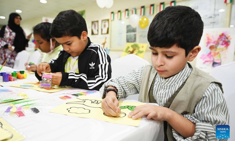 Children participate in a drawing workshop during an exhibition of artistic paintings for children in Hawalli Governorate, Kuwait, on Nov. 22, 2021.Photo:Xinhua