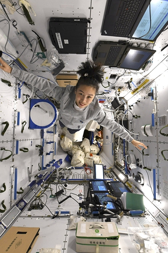 Photo provided by the Astronaut Center of China shows Chinese female taikonaut Wang Yaping in the space station core module Tianhe.(Photo; Xinhua)