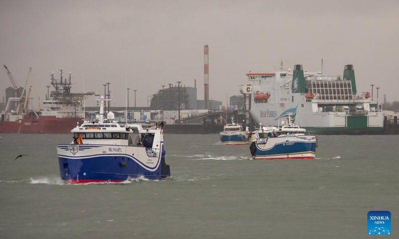 French fishing boats are seen at the entrance to the port of Calais, France, on Nov. 26, 2021.Photo:Xinhua