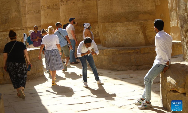Tourists visit the Karnak Temple Complex in Luxor, Egypt, on Nov. 26, 2021.Photo:Xinhua