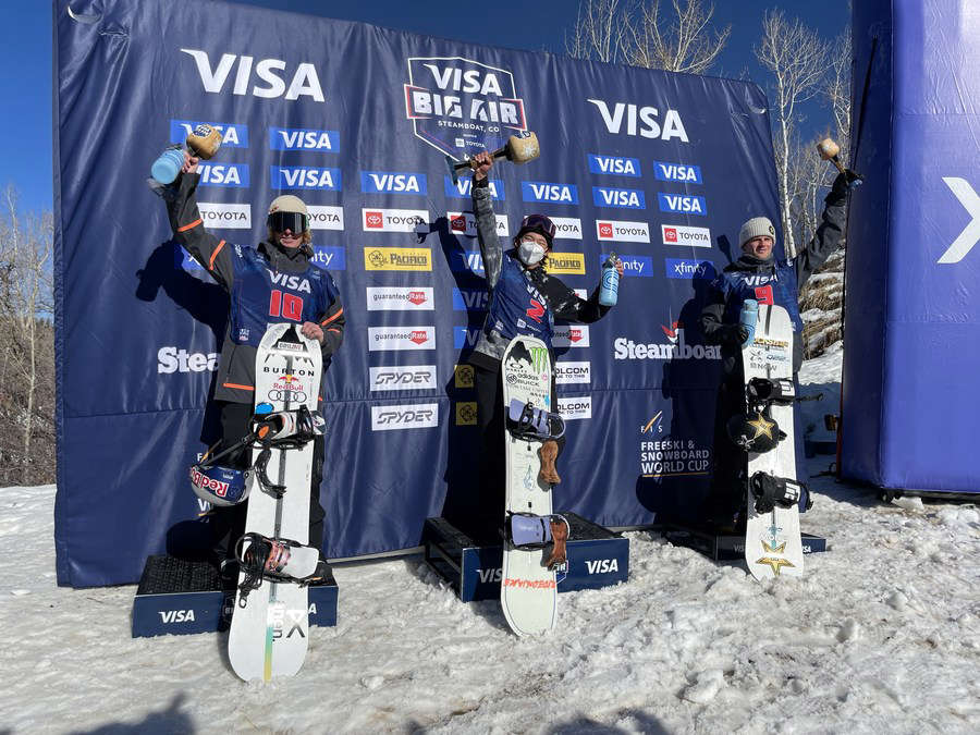 Su Yiming (M) takes his maiden World Cup victory in Steamboat, the United States, December 5. Photo: Xinhua