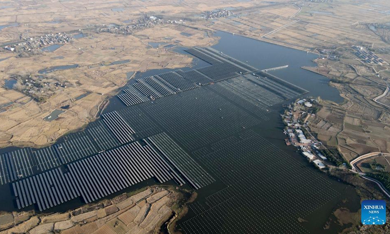 Aerial photo taken on Nov. 24, 2021 shows a photovoltaic (PV) power station at Jiangji reservoir in Hefei, east China's Anhui Province. A PV power station with a designed installed capacity of 50 megawatts at Jiangji reservoir in Hefei was successfully connected to the grid on Nov. 30.(Photo:Xinhua)