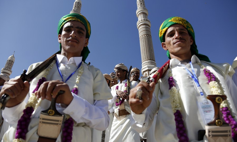 Grooms attend a mass wedding in a public square in Sanaa, Yemen on Dec. 2, 2021.(Photo: Xinhua)