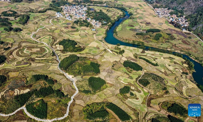 Aerial photo taken on Dec. 2, 2021 shows the scenery of Dongxiang Village, Tantou Township, Rong'an County, south China's Guangxi Zhuang Autonomous Region.(Photo: Xinhua)