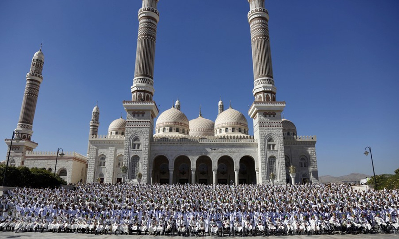 Grooms attend a mass wedding in a public square in Sanaa, Yemen on Dec. 2, 2021.(Photo: Xinhua)