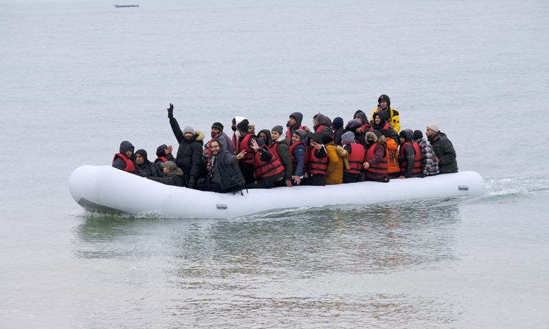 Migrants arrive on a beach in Dungeness, Britain on Nov. 24, 2021. (Photo: Xinhua)