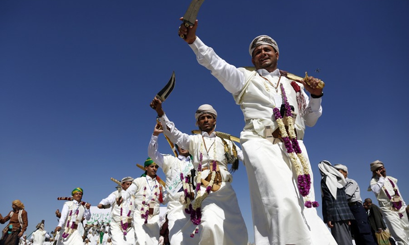 Grooms attend a mass wedding in a public square in Sanaa, Yemen on Dec. 2, 2021.(Photo: Xinhua)