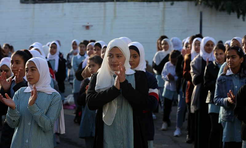 Palestinian students are seen at the al-Lubban secondary school in the village of al-Lubban al-Sharqiya near the West Bank city of Nablus, on Nov. 24, 2021.(Photo: Xinhua)
