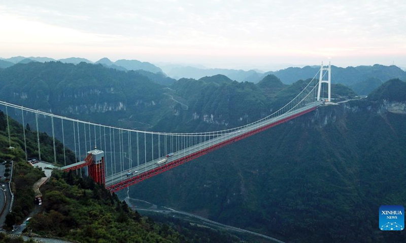 Aerial photo taken on Dec. 2, 2021 shows the Aizhai suspension bridge in Xiangxi Tujia and Miao Autonomous Prefecture, central China's Hunan Province.(Photo: Xinhua)