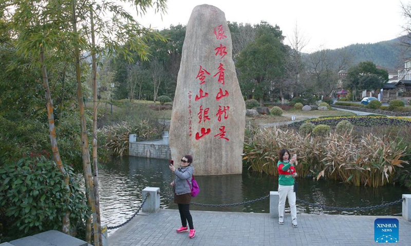 Tourists visit Yucun Village of Anji, east China's Zhejiang Province, Dec 3, 2021.Photo:Xinhua