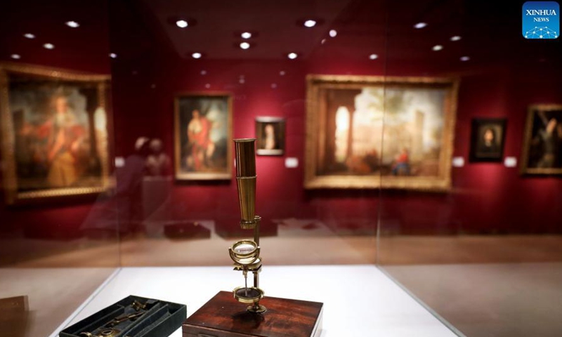 The Charles Darwin Family Microscope for auction is seen during a media preview of the Christie's London Classic Week auction in London, Britain, Dec. 3, 2021. Christie's London Classic Week presents art from antiquity to the 21st century, spanning five live auctions and four online-only sales.Photo:Xinhua