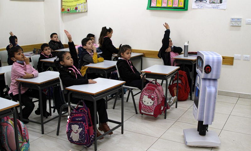 An interactive robot is seen inside a classroom, at al-Basma school in Gaza City, on Nov. 28, 2021.(Photo: Xinhua)