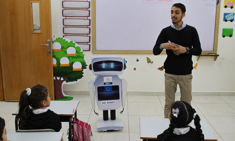 An interactive robot is seen inside a classroom, at al-Basma school in Gaza City, on Nov. 28, 2021.(Photo: Xinhua)
