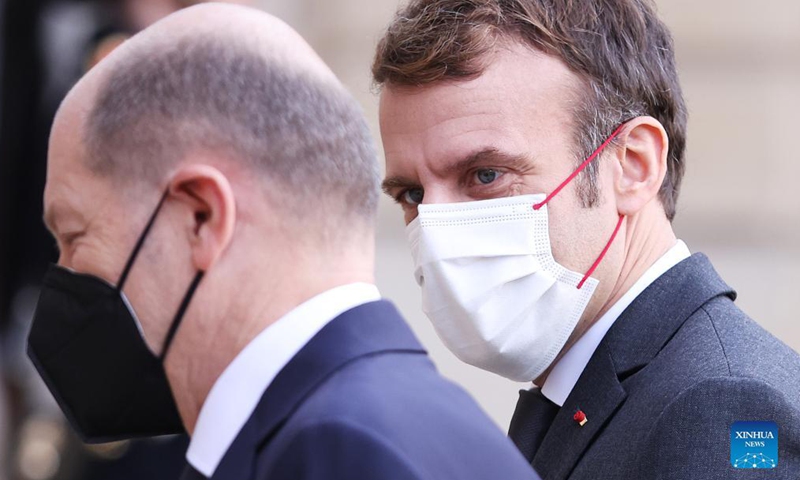 French President Emmanuel Macron greets new German Federal Chancellor Olaf Scholz at the Elysee Palace, in Paris, France, Dec. 10, 2021.Photo:Xinhua