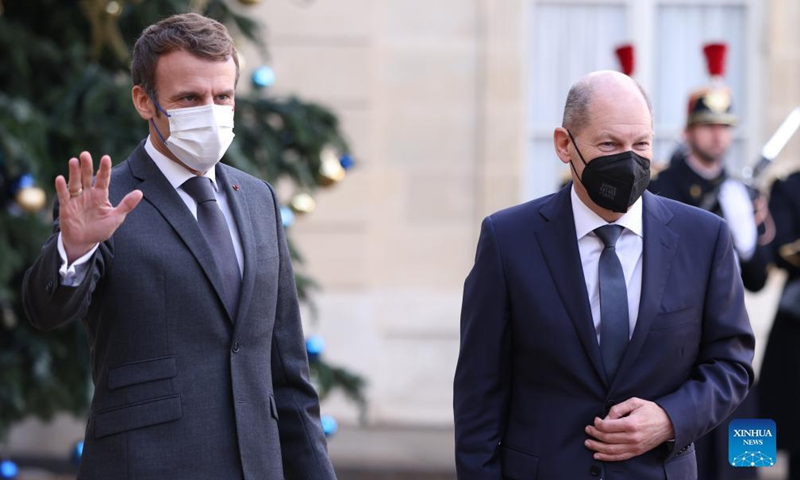 French President Emmanuel Macron greets new German Federal Chancellor Olaf Scholz at the Elysee Palace, in Paris, France, Dec. 10, 2021.Photo:Xinhua