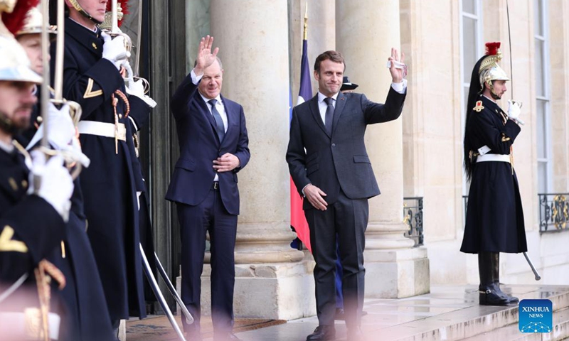 French President Emmanuel Macron greets new German Federal Chancellor Olaf Scholz at the Elysee Palace, in Paris, France, Dec. 10, 2021.Photo:Xinhua