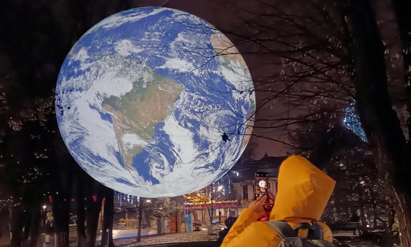 A light installation is exhibited in a park during the Lights On Romania festival in Bucharest, Romania, on Dec. 10, 2021.Photo:Xinhua