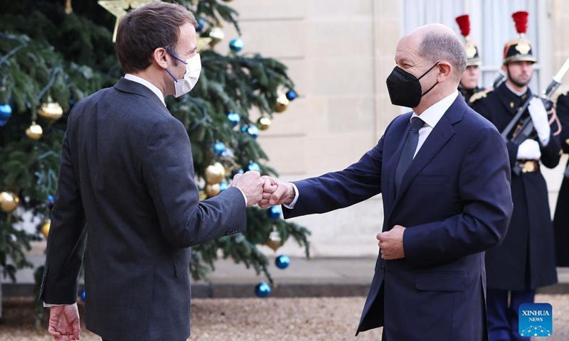 French President Emmanuel Macron greets new German Federal Chancellor Olaf Scholz at the Elysee Palace, in Paris, France, Dec. 10, 2021.Photo:Xinhua