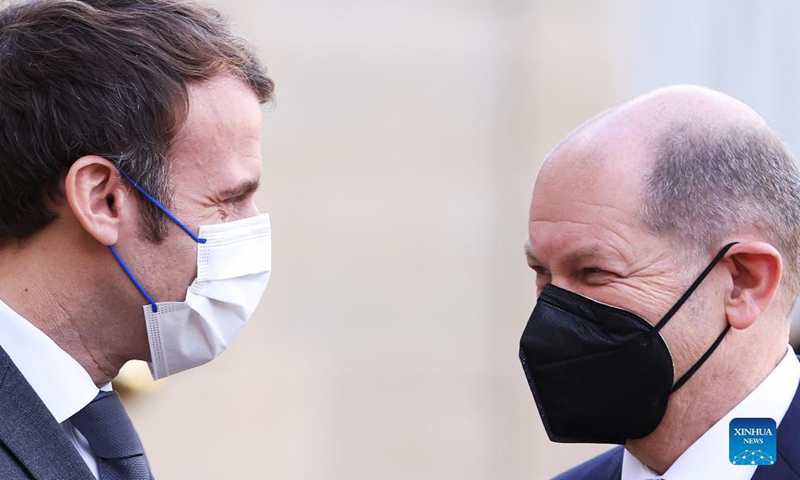 French President Emmanuel Macron greets new German Federal Chancellor Olaf Scholz at the Elysee Palace, in Paris, France, Dec. 10, 2021.Photo:Xinhua