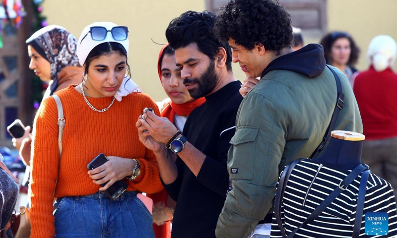 People visit a handmade products fair at Fayoum Art Center in Tunis village of Fayoum, Egypt, Dec. 10, 2021.Photo:Xinhua