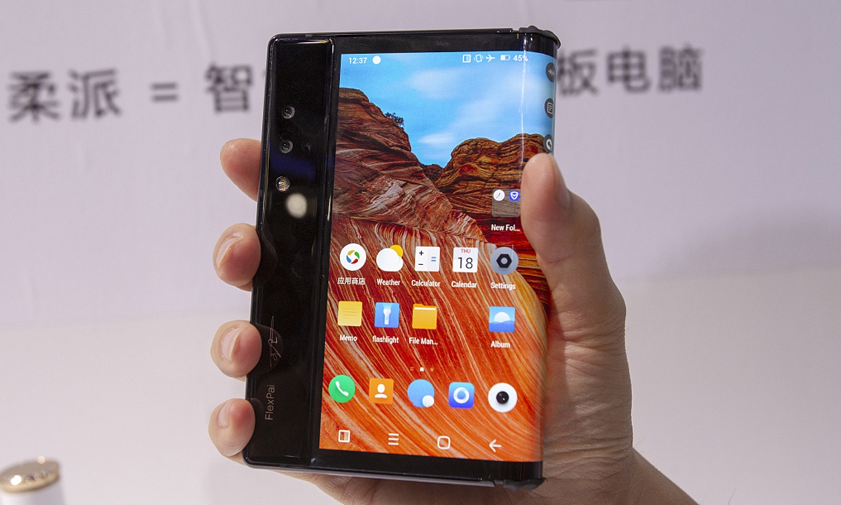 FlexPie, a flexible display foldable smartphone developed by Royole is displayed at the 7th China (Shanghai) International Technology Fair on April 18, 2019. Photo: VCG