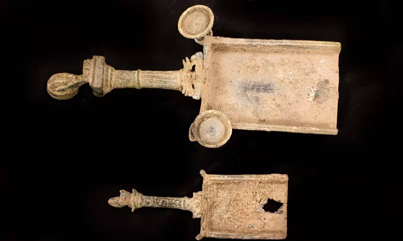 Photo shows two 1,900-year-old bronze incense burners seized by the Israeli police from antiquity dealers in Jerusalem. (Photo: Xinhua)