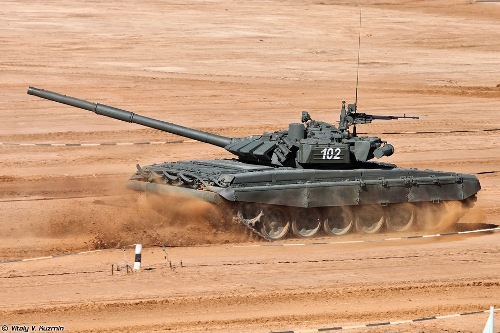 colorful tanks in military drill