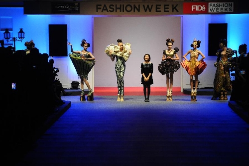 Models present creations by Chinese designer Guo Pei in FIDe Fashion ...
