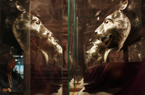 Bronze heads once belonging to sculptures of the 12 Chinese zodiac signs on display at the Poly Art Museum in Beijing in 2009 Photo: CFP