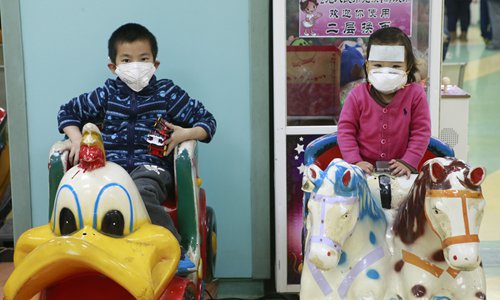 Sick children and their parents crowded into the infusion center of Beijing Children's Hospital on December 21, 2016, five days after Beijing issued an air pollution red alert. Patients had to be placed on a waiting list of more than 200 names ahead, with each child waiting an average of two hours according to the Global Times reporter. Photos: Li Hao/GT