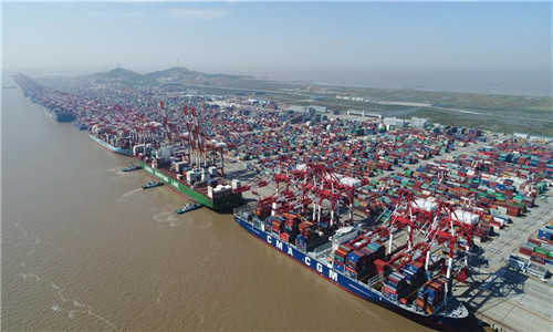 Aerial photo taken on April 23, 2017 shows a container wharf of Yangshan Port in Shanghai, east China. Yangshan Port is China's first port built on islands. Shanghai, one of the most important cities in east China, has contrainer trade with more than 500 ports of 214 countries and regions. In 2016, Shanghai port has kept standing at No. 1 in container throughput in the world for seven years in a row. (Xinhua/Ding Ting)