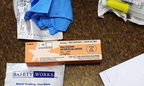 Inset: A box of Naloxone Hydrochloride, an antidote used to block opioid effects, especially overdoses. Photo: CFP