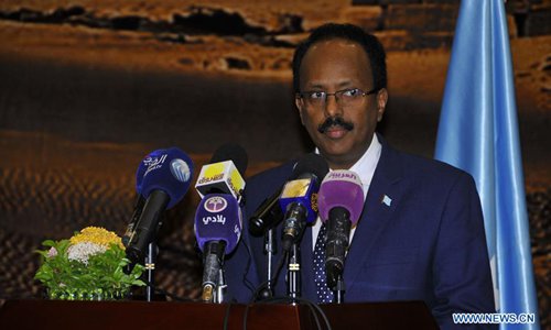 Somali President Mohamed Abdullahi Mohamed speaks during a joint press conference with his Sudanese counterpart Omar al-Bashir (not seen in picture) in Khartoum, capital of Sudan, on Oct. 5, 2017. Sudanese President Omar al-Bashir said on Thursday that his country would exert utmost efforts for peace and stability in Somalia. The President made the remarks at a joint press conference after a meeting with Mohamed Abdullahi Mohamed in the capital. (Xinhua/Mohamed Khidir)
