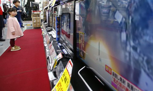 In this Feb. 7, 2016, file ., children watch TV screens reporting North Korea's satellite launch at an electronics store in Tokyo. For nearly 70 years, the three generations of the Kim family have run North Korea with an absolute rule that tolerates no dissent. The ruling family has devoted much of the country's scarce resources to its military but has constantly feared Washington is intent on destroying the authoritarian government.file photo: IC
