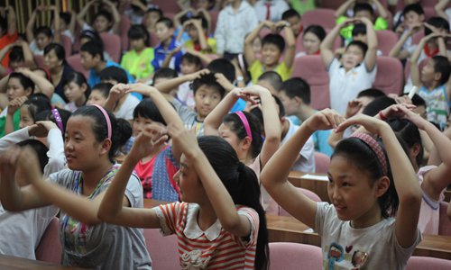 Young Chinese students learn how to protect themselves from sexual harassment in a class to publicize sex education and prevention from sexual assault at Beida Huaishu No.1 Primary School in Jinan, East Chinas Shandong Province. Photo: IC