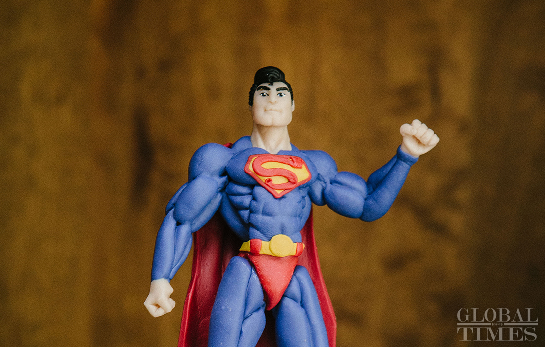 the picture shows a superman dough sculpture created by lang jia