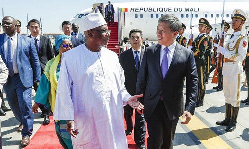 Malian President Ibrahim Boubacar Keita (L) arrives at Capital International Airport in Beijing, capital of China, Aug. 29, 2018. Ibrahim Boubacar Keita is here to attend the Beijing Summit of the Forum on China-Africa Cooperation (FOCAC). (Xinhua/Shen Bohan)