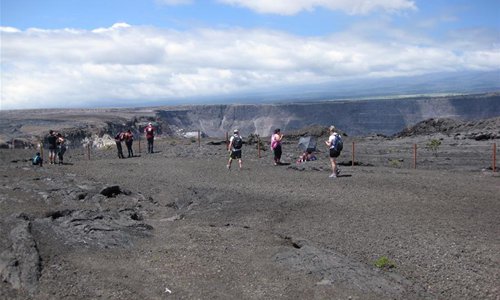 People tour Hawaii Volcanoes National Park in Hawaii, the United States, Sept. 22, 2018. Hawaii Volcanoes National Park located in the U.S. Pacific island state of Hawaii reopened Saturday morning after being closed for 134 days due to the eruption of Kilauea volcano. (Xinhua/Chen Bing)