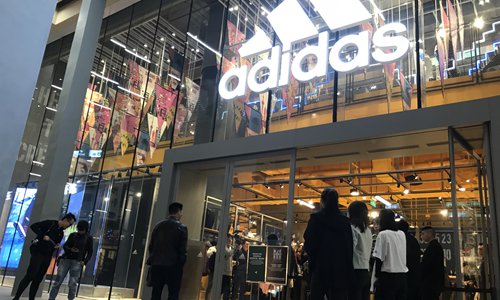 Adidas opens a new brand center, similar in size to a flagship store, in a shopping mall on Shanghai's Nanjing East Road on Wednesday. Photo: Xie Jun/GT