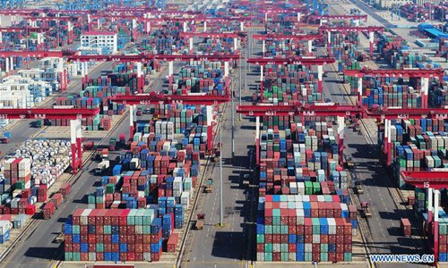 Aerial photo taken on Nov. 8, 2018 shows the container terminal of Port of Qingdao, east China's Shandong Province. China's foreign trade will maintain steady growth in 2018, as the country's economy posted stable performance amid mounting external uncertainties, according to a report released by the Ministry of Commerce. China's foreign trade saw fast growth in the first three quarters, the report said. The country's goods trade rose 11.1 percent year-on-year to 27.88 trillion yuan (about 4 trillion U.S. dollars) in the first 11 months this year, customs data showed. The report also said that the Chinese economy currently showed many favorable conditions to sustain medium-high growth and move toward a medium- to high-end level, laying a solid foundation for the development of foreign trade. (Xinhua/Yu Fangping)