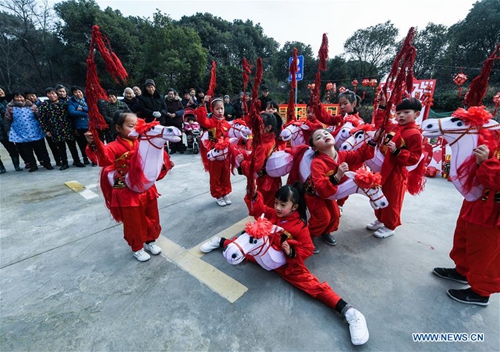 Children perform traditional folk dance to greet Spring Festival in ...