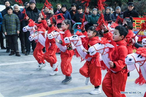 Children perform traditional folk dance to greet Spring Festival in ...